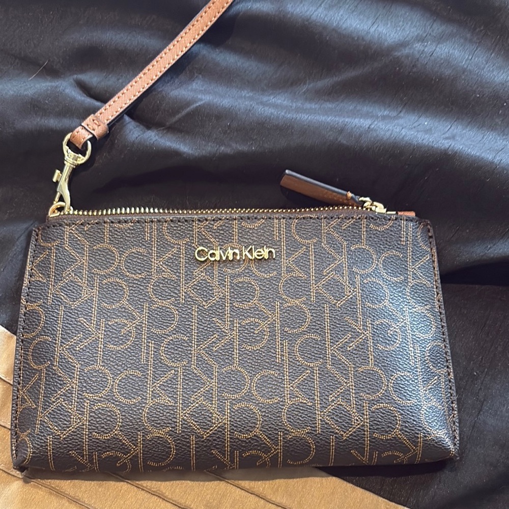 Calvin Klein Black and Tan Monogram Clutch